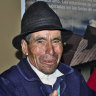 Baltasar Ushca, the last ice merchant of Chimborazo and his daugther. He is showing a piece of natural ice from Chimborazo’s glacia, Ecuador.