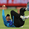 Fawad Ahmed of the Strikers takes the controversial catch to dismiss the Thunder’s Usman Khawaja.