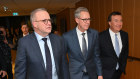 Prime Minister Anthony Albanese arrives at the Business Council of Australia Annual Dinner at the Hyatt Regency with BCA president Geoff Culbert and CEO Bran Black.