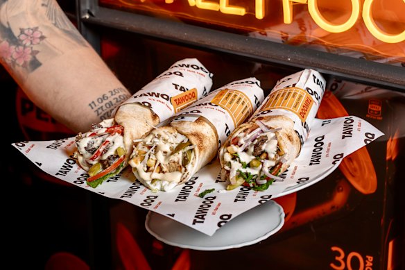 Tawooq’s flatbread chicken wrap includes meat marinated overnight in garlic, lemon and toum (garlic sauce).
