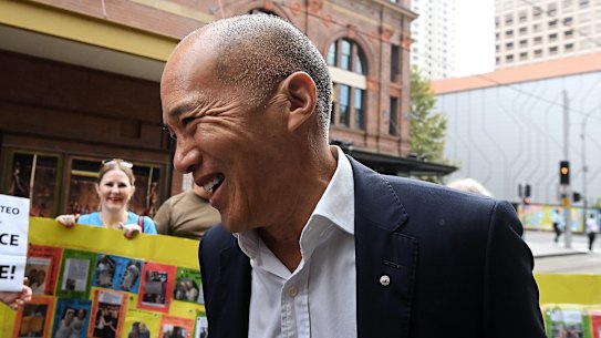 Charlie Teo is greeted by well-wishers as he arrives at a disciplinary hearing in Sydney on Tuesday.