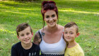 Brisbane woman Chantelle Hamilton, 33, uses ChatGPT to save time on everyday tasks and use extra hours to play with her boys Tyler (left) and Jhye at the park.