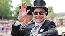Stanley Tucci takes part in the royal carriage procession on day three of Royal Ascot 2026 at Ascot Racecourse on June 18, 2026 