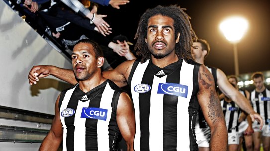 Leon Davis (left) with then-teammate Heritier Lumumba in 2011.