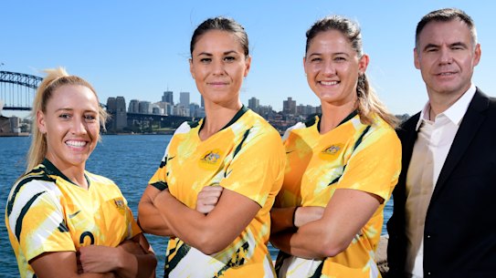 Coach Ante Milicic and members of the Matildas squad.