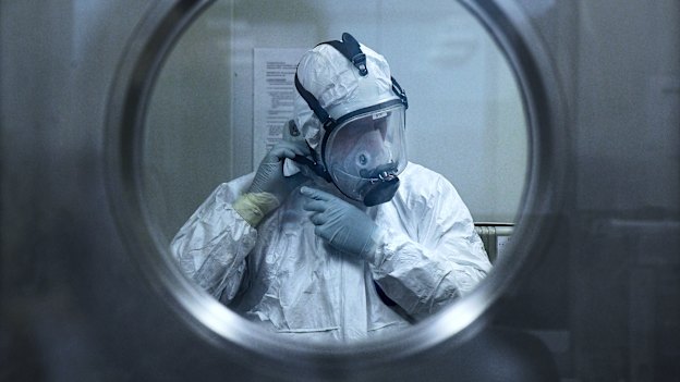 Associate Professor Stuart Turville dons protective equipment while working at St Vincent’s Centre for Applied Medical Research.