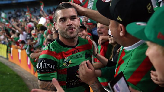 Adam Reynolds celebrates with Rabbitohs fans after starring in the epic 2014 grand final victory.