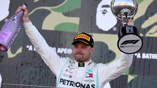 Flying Finn: Race winner Valterri Bottas celebrates in Suzuka.