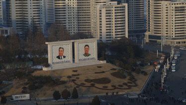Portraits of late North Korean leaders Kim Il-Sung and Kim Jong-il in Pyongyang. 
