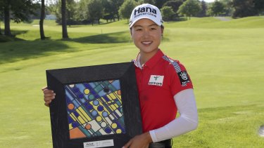 Family ties: Minjee Lee is currently leading the way, but brother Min Woo is on the charge