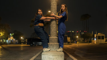 Girls gone wild: Molly (Beanie Feldstein) and Amy (Kaitlyn Dever) try pole dancing.