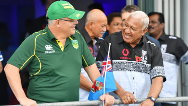 Prime Minister Scott Morrison enjoys the match with his Fijian counterpart Frank