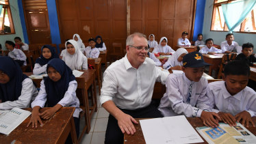 Australian Prime Minister Scott Morrison speaks to students at SMPN 2 Babakan Madang High school in Jakarta, his first overseas trip as PM.