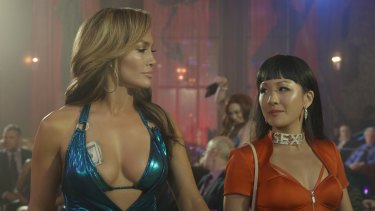 The bond between strippers Ramona (Jennifer Lopez) and Destiny (Constance Wu) is the heart of Hustlers. 