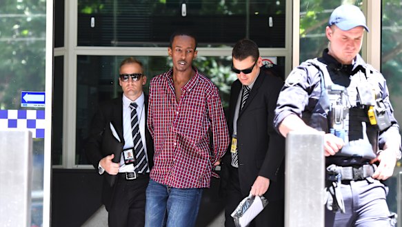 A 19-year-old Ali Khalif Shire Ali being arrested in relation to committing acts in preparation for a terrorist attack in 2017.