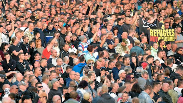 Protesters gather for a far-right protest in Chemnitz, Germany.