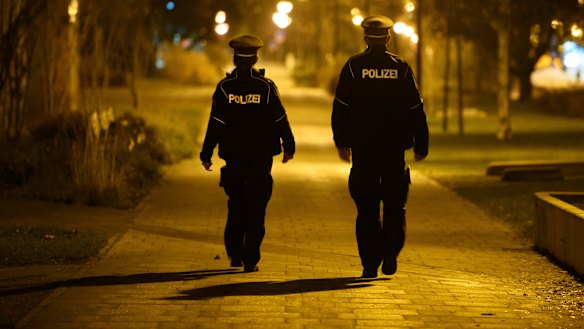 Police patrol the Gorbitz  district of Dresden, Germany.