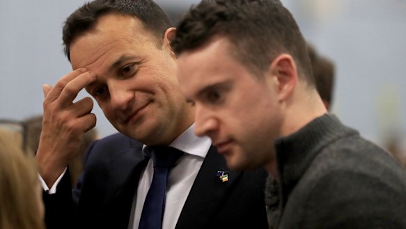 Irish PM and Fine Gael leader Leo Varadkar, left, with his partner Matthew Barrett at the Dublin West count on Sunday.