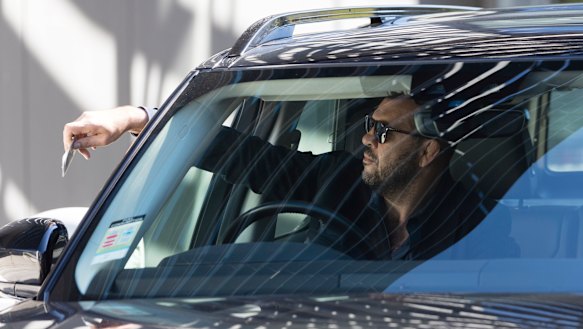 Checking out: Michael Cheika leaves the rugby headquarters at Moore Park on Saturday.