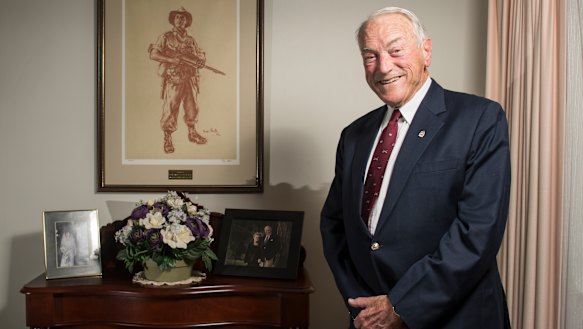 Major General Peter Phillips (Ret) was the commander of D Company, 3 RAR, during the battle of Coral Balmoral. He is pictured with an iconic image of a digger in New Guinea by Ivor Hele.