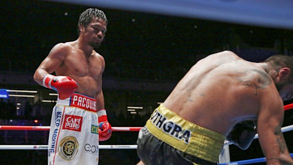 Fall guy: Manny Pacquiao knocks down Lucas Matthysse in Kuala Lumpur.