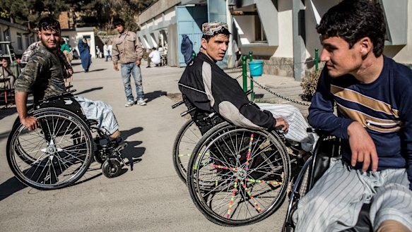 Afghan National Army soldiers who suffered traumatic amputations take a break between physiotherapy sessions at the orthopedic centre.