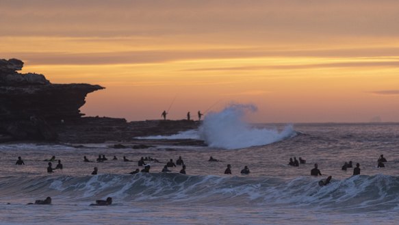 Surfers return to Maroubra beach on Monday.