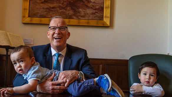 Dr Michael Spence with his sons Theodore and Hugo