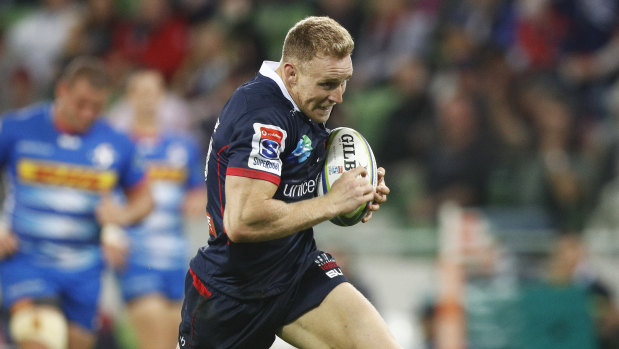 Reece Hodge runs a try in for the Rebels against the Stormers at AAMI Park in Melbourne on Friday night.