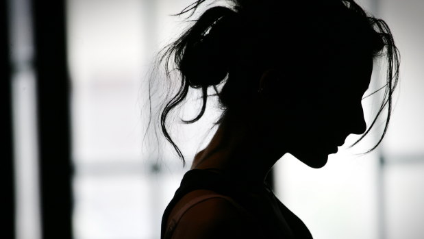 A woman was forced to remain at her workplace after she was allegedly threatened and emotionally abused.