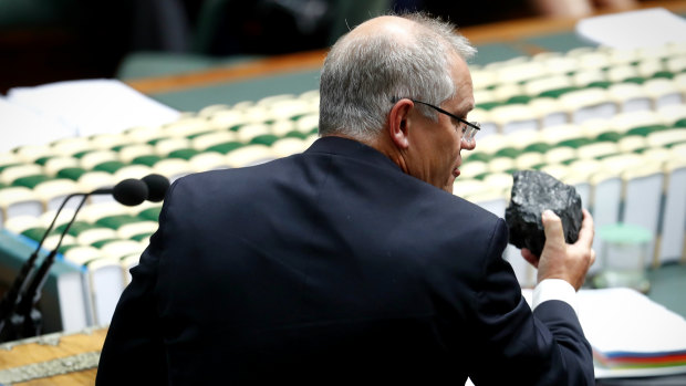 Then treasurer Scott Morrison holds up a lump of coal in Parliament in February 2017. 
