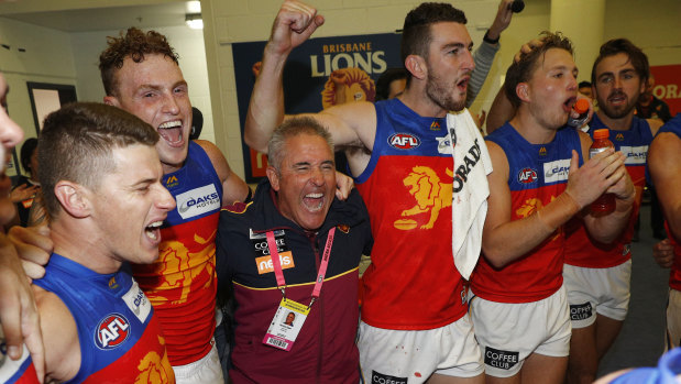 Chris Fagan and the Lions celebrate after their second win of the season.