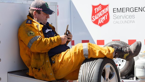 A rural firefighter is seen at the Peregian Springs Control in Peregian Springs.