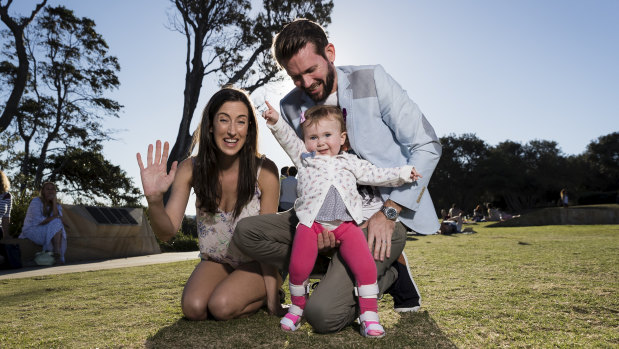 Bethan and Johnny McElwee with their daughter Aviana who has SMA1 and is undergoing Spinraza treatment.