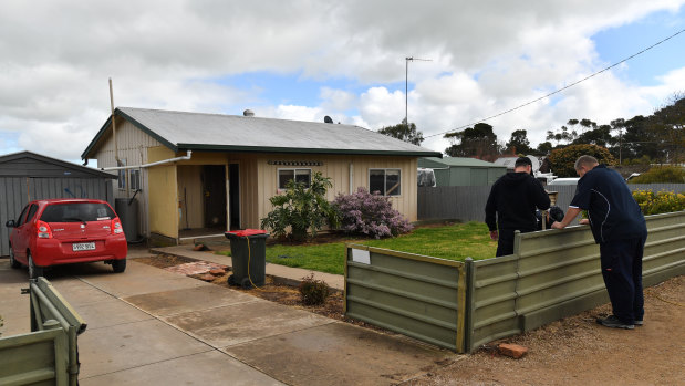 Police at the property in the country town of Maitland, South Australia, on Thursday.