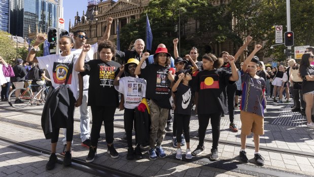 Young people show their support at the rally against deaths in custody.