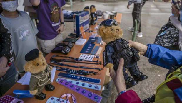 Riot-gear-clad teddy bears, for sale at the Hong Kong Police College in Hong Kong during National Security Education Day.