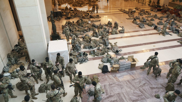 Hundreds of National Guard troops stationed inside the US Capitol ahead of the impeachment vote. 