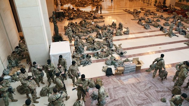 Hundreds of National Guard troops stationed inside the US Capitol ahead of the impeachment vote. 