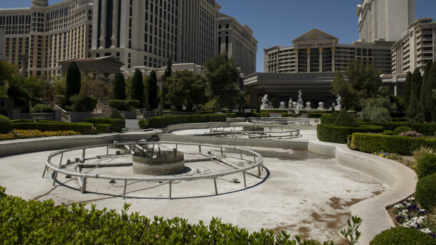 Drained fountains are seen outside Caesars Palace hotel and casino in Las Vegas, Nevada.