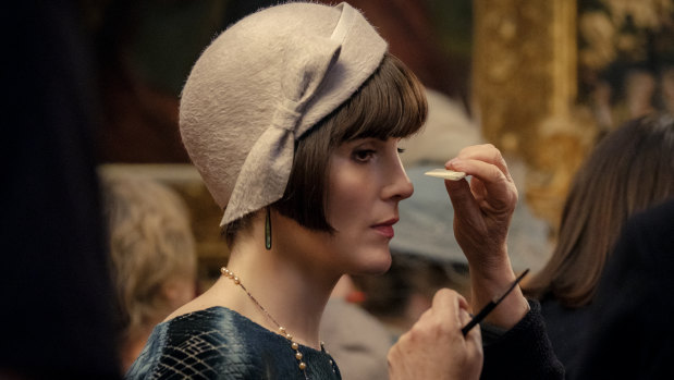 Michelle Dockery has make-up applied during filming on Downton Abbey the film.