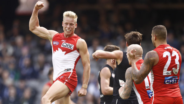 Off the mark: Isaac Heeney celebrates a goal in the Swans' first win of the season.