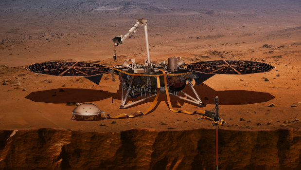 This illustration shows the InSight lander drilling into the surface of Mars. 