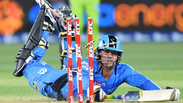 Alex Carey of the Adelaide Strikers is run out.