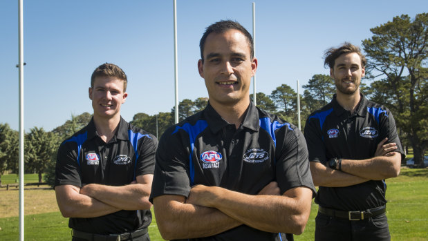 Gungahlin Jets new coach John Love flanked by captain Joseph Looby and Nathan Smith.