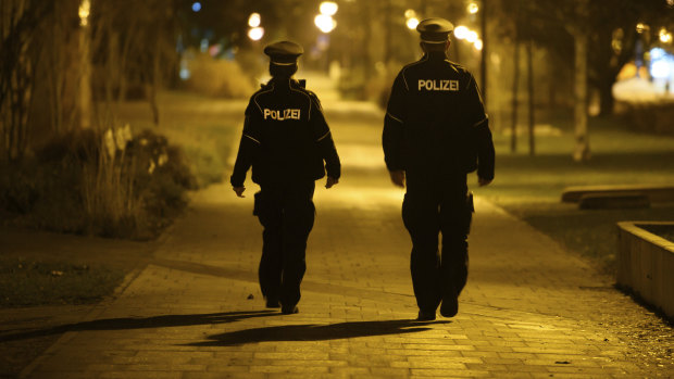 Police patrol the Gorbitz  district of Dresden, Germany.