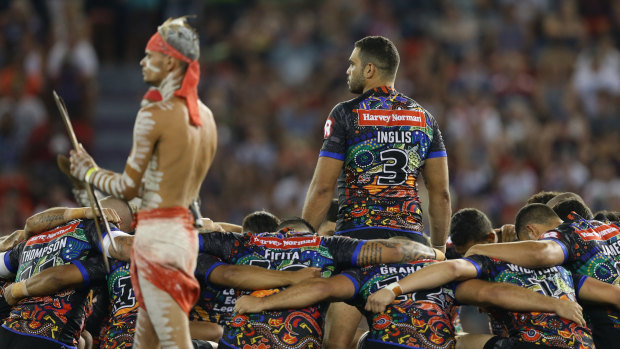 Cultural pride: Greg Inglis leads the Indigenous All Stars.