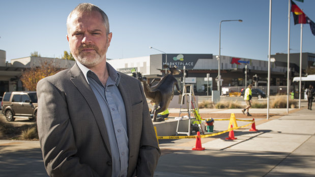 Celebrate Gungahlin festival committee member, David Pollard at the site where the festival would usually be held, which is surrounded by construction sites.