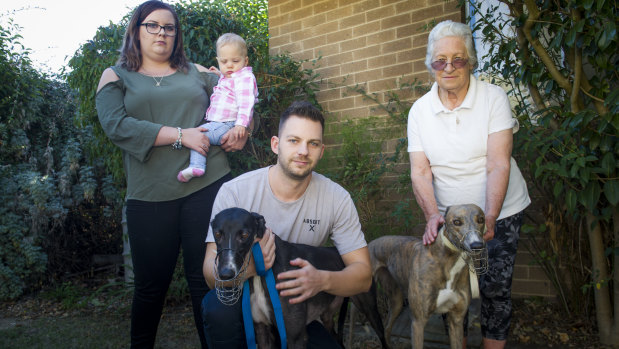 Greyhound trainer Chris Priestley with his sister, Jade Priestley and niece Ava, 13 months (left), with his grandmother Deidre Jenkins who has been a part of the greyhound industry for 44 years. 