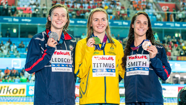 Ariarne Titmus, centre, after winning gold in the 400m freestyle at the World Championships in South Korea.